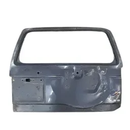 TAMPA TRASEIRA PAJERO GLS-B 1992 A 2000 AMASSADO
